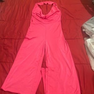 Hot pink jumpsuit, size medium from fashion nova and never worn it.